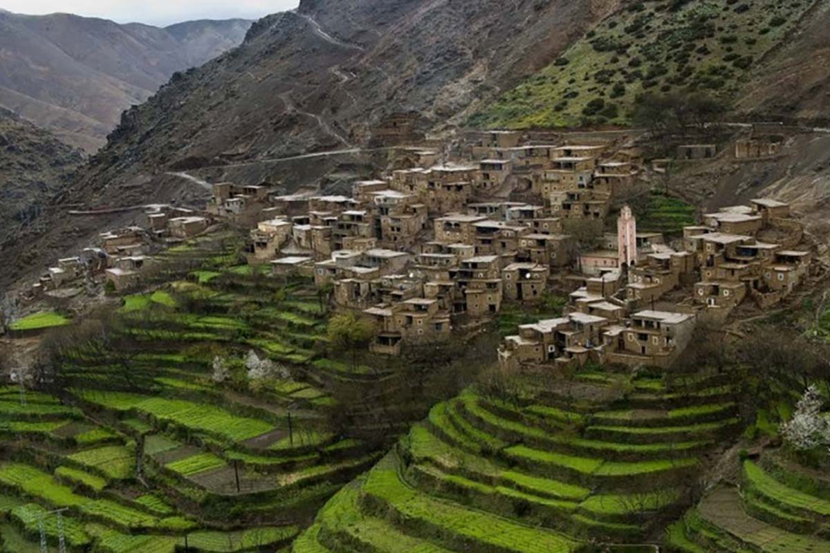 Berber village surrounded by terraced fields in the High Atlas Mountains of Morocco
