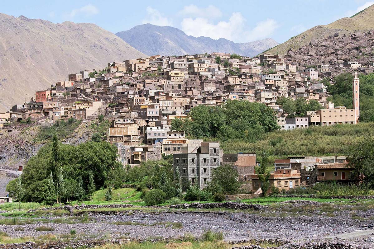 Traditional Berber village in the Imlil Valley surrounded by High Atlas mountains